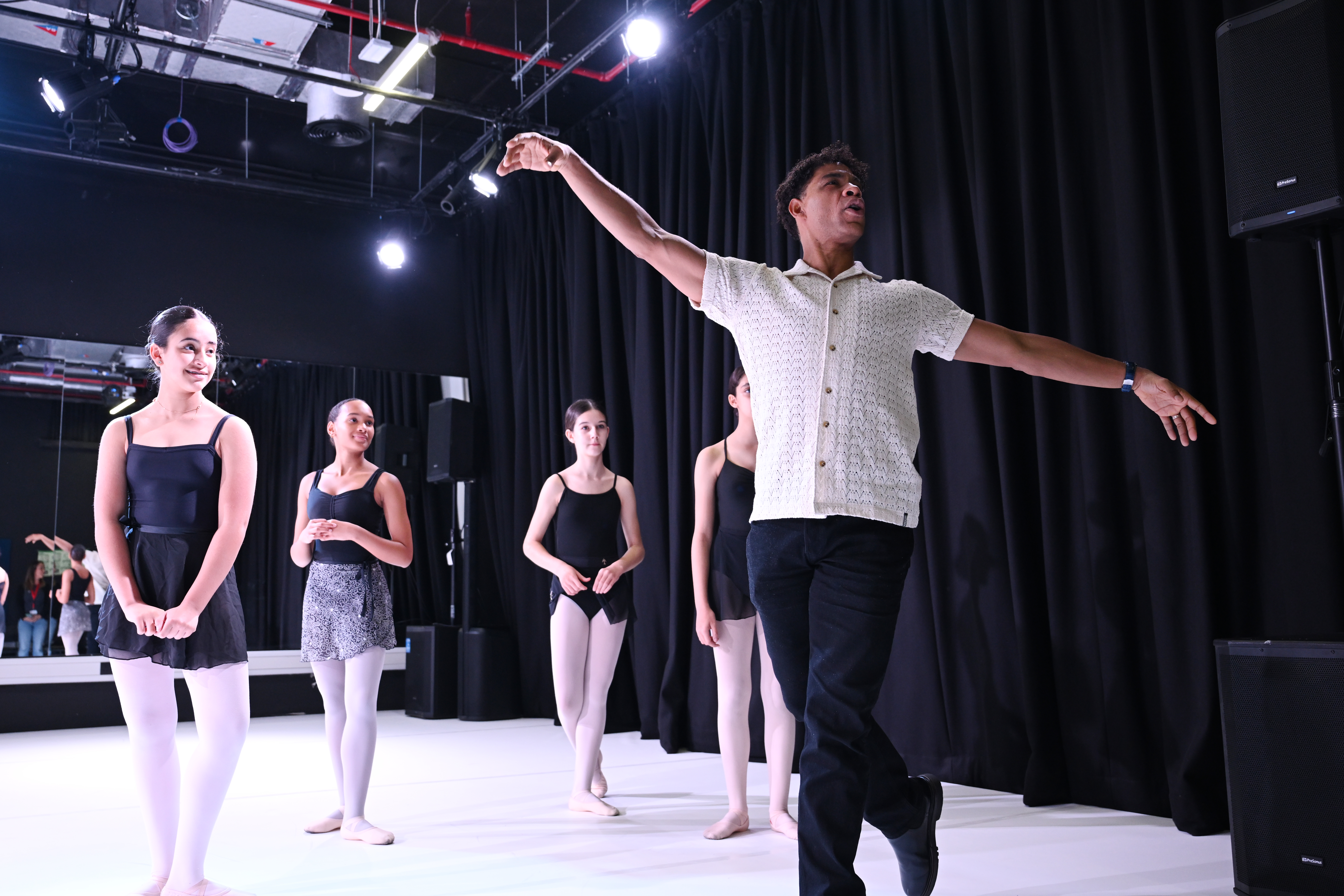 Students rehearsing and performing through SRI creative arts partnerships